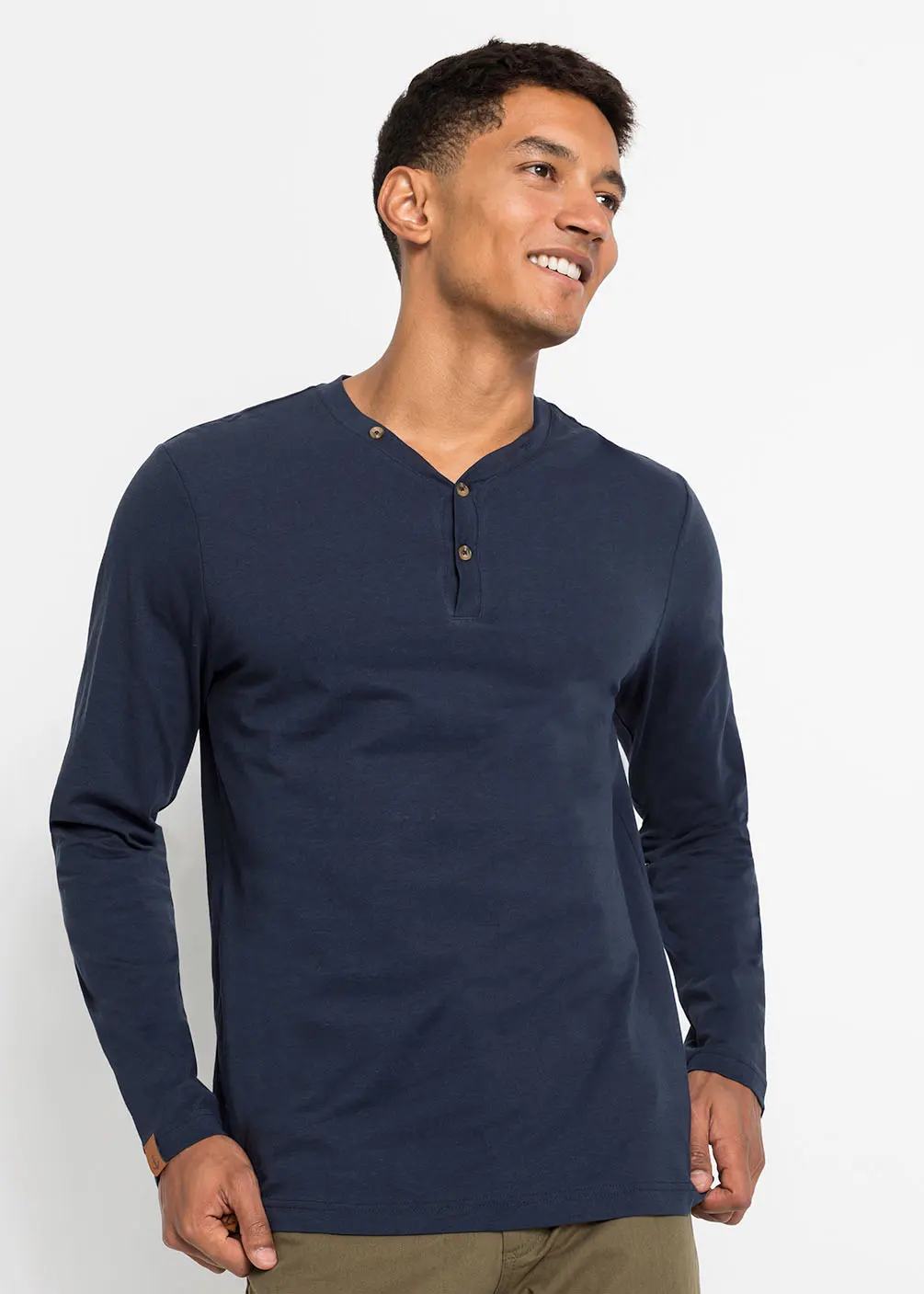Men’s navy long-sleeve shirt and olive trousers